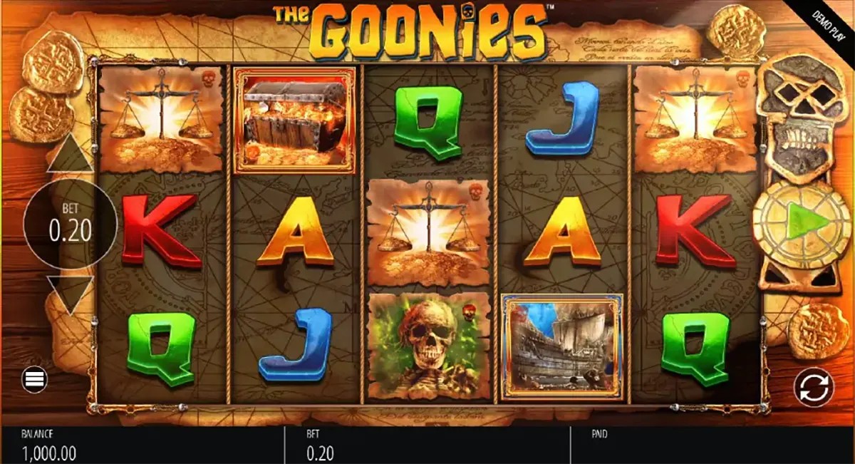 Screenshot of The Goonies slot game with five reels showing colourful card symbols (A, K, Q, J) and adventure-themed icons like a treasure chest, skull, and ship, with a bet set to 0.20 and spin controls on the right.